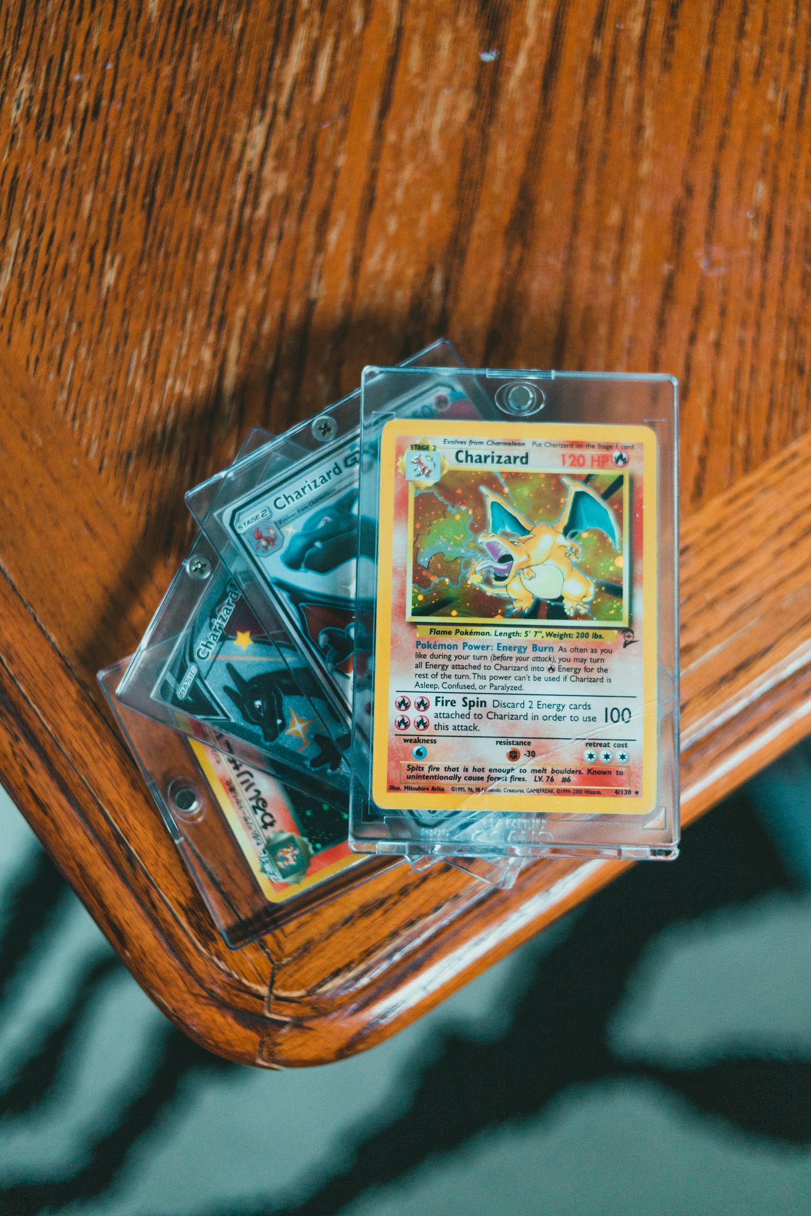 Pokemon card surface damage guide: how to spot scratches, dents, print lines, and holo wear